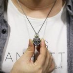 pendentif argenté dragon